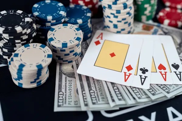 Live baccarat dealer at professional studio table with multiple camera angles