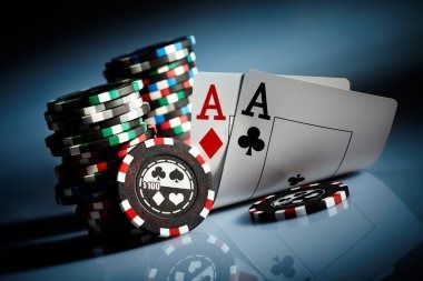Mobile phone displaying ducati Bigger Bass Bonanza table selection and betting interface